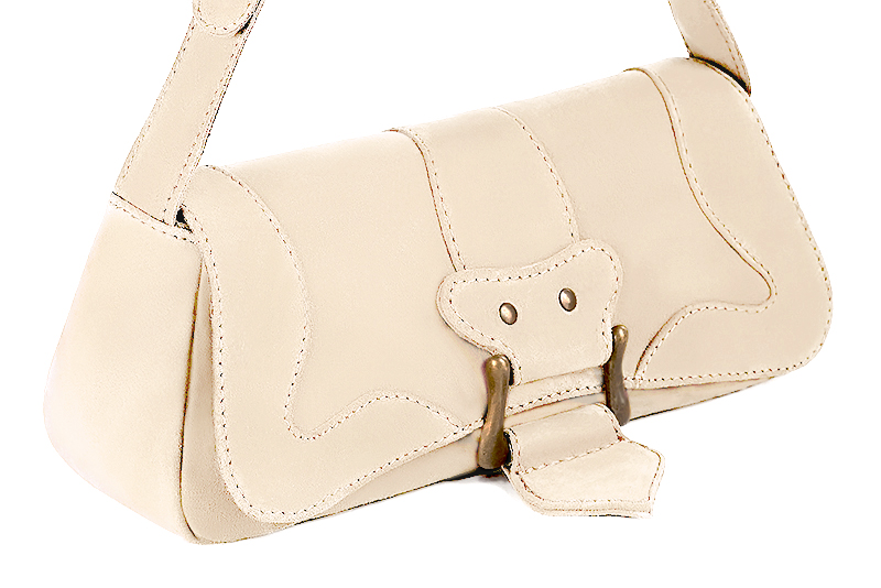 Handcrafted women's small luxurious elegant handbag in premium egg shell beige leather. Perfect for elevated everyday style.   
                Choose from our luxurious collections of leather and fabric to perfectly match your handbags to your outfits.
